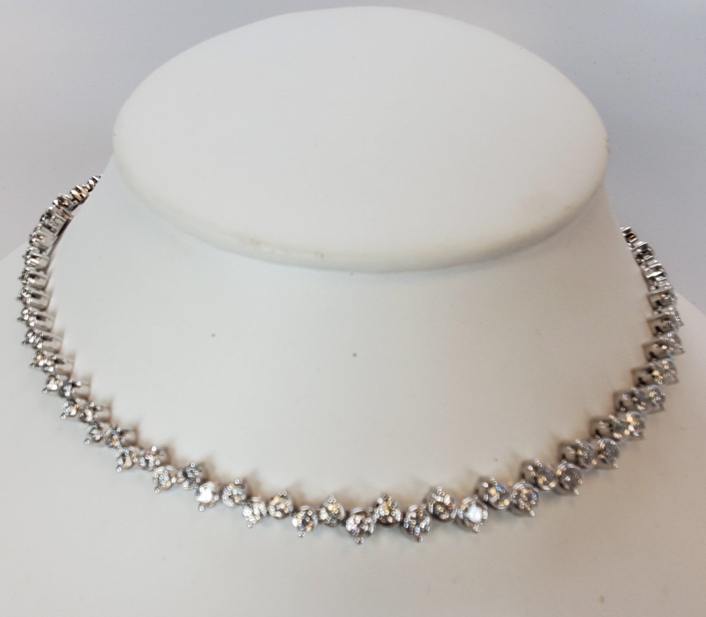 18 karat white gold diamond necklace sold at auction